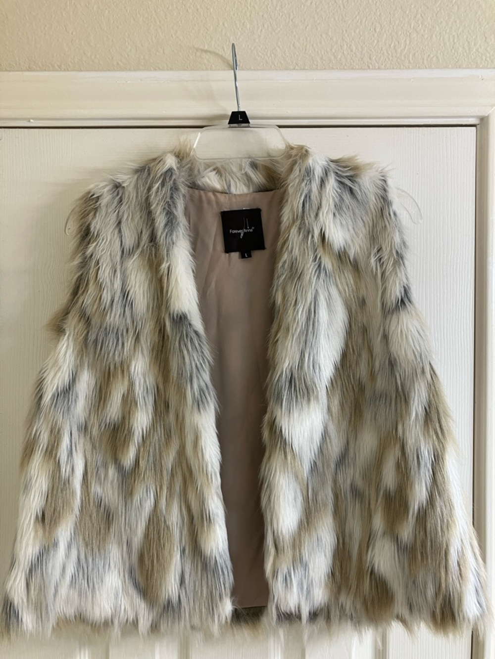 Forever 21 Beige and Black Labeled Jacket Vest. Faux fur.